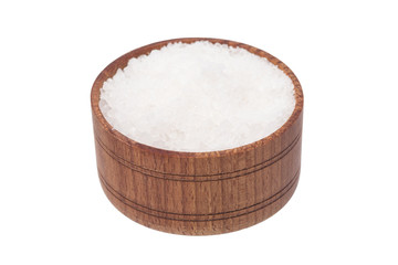 salt in a wooden cup, over white background