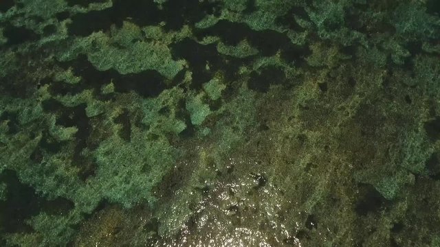 Aerial view of beautiful beach, hotels and tourists, Pura geger,Bali, Indonesia. Seascape: beach, ocean, sky, sea. 4K video Travel concept Aerial footage