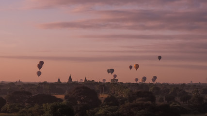 Balloons flying over Dhammayangyi Temple in Bagan Myanmar, Ballooning over Bagan is one of the most memorable action for tourists.
