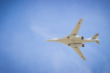 bomber flies in the blue sky