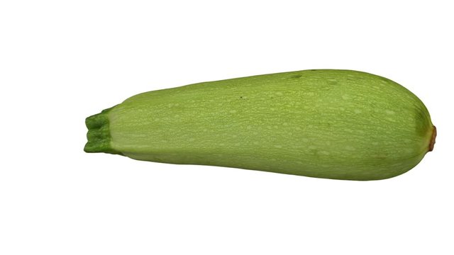 Realistic render of a rotating zucchini (Magda variety) on white background. The video is seamlessly looping, and the 3D object is scanned from a real zucchini.
