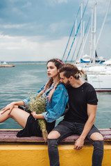 Guy and girl on pier
