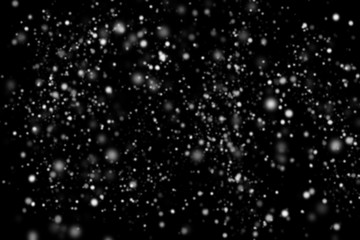 Abstract snowfall on black background