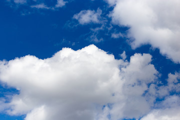 Clouds on a blue sky as a background