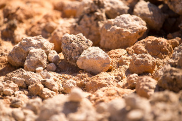 Red clay soil on nature as a background