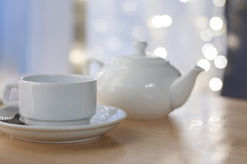 Fototapeta na wymiar white Cup on table in cafe