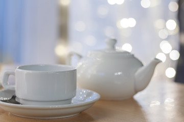 white Cup on table in cafe