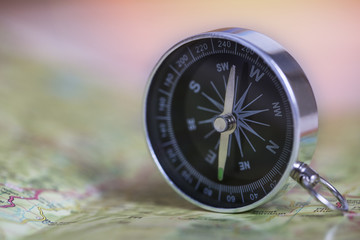 Compass on map. Travel and adventure Concept.