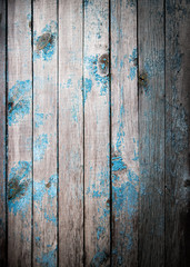 Fototapeta na wymiar old wooden boards painted with blue paint
