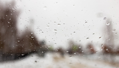 Drops on the car window in winter