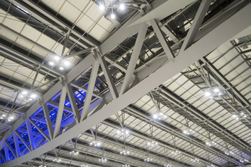 Large steel frame in the building with spotlights.