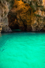 Fototapeta na wymiar Lagos Caves and Seashore. Exposure done in a boat tour in the Lagos seashore, Algarve, Portugal.