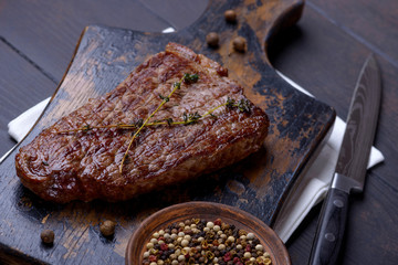 Closeup grilled steak on cutting board