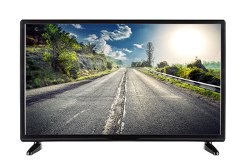 Flat high definition TV with mountain road on the screen