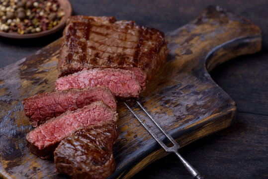 Sliced medium rare grilled steak