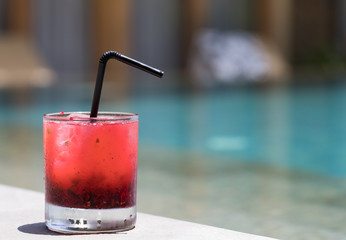 Raspberry mojito cocktail by resort pool, Bali, Indonesia