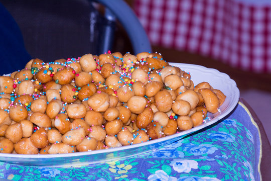 Close Up Of Traditional Italian Food Called Strufoli On Blur Background