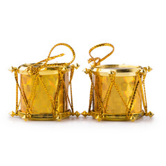 Fototapeta na wymiar Christmas toys Golden drums isolated on white background