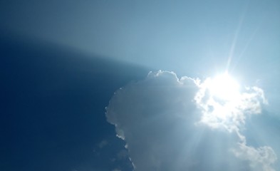 Sun on cloudy sky photo 