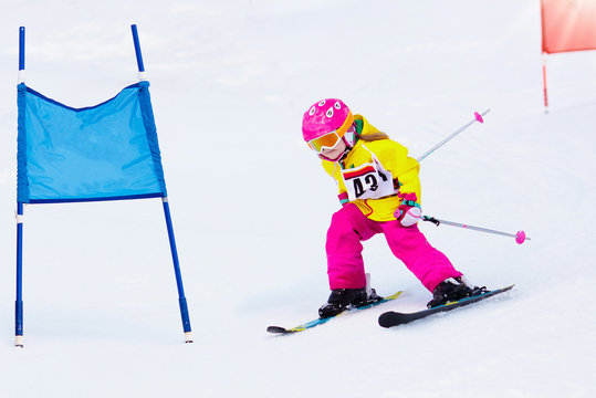 Ski and snow fun. Kids skiing. Child winter sport.