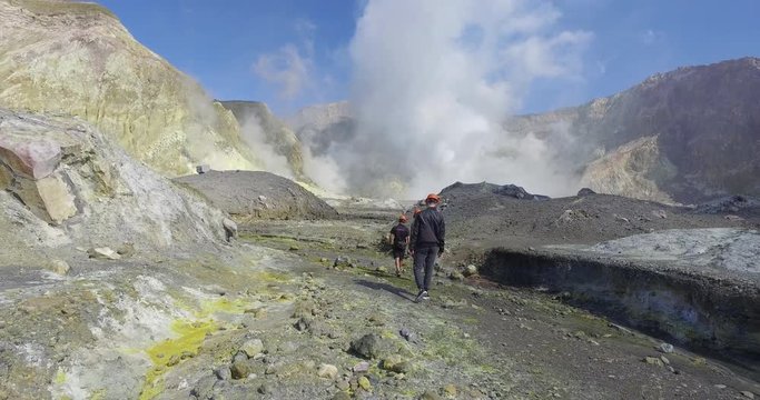 NEW ZEALAND – MARCH 2016 : Video shot of people walking up to active volcano on White Island on a beautiful day