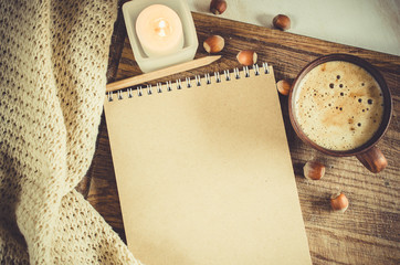 Day at home with coffee and empty notebook.