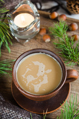 Hot cocoa, warm pleid and candle. Rustic life.