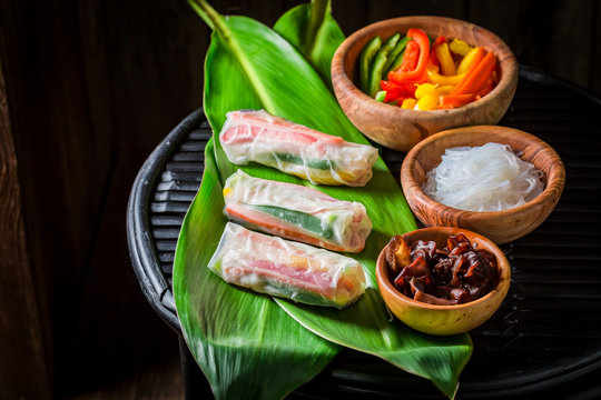 Preparing spring rolls with sweet and sour sauce