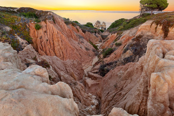 Praia do Camilo at sunrise, Algarve, Portugal