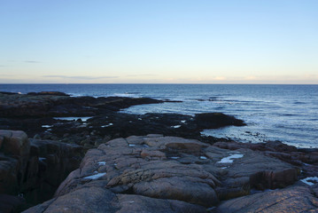 Landscape of round shape rocks beach at Barents sea in Terriberka