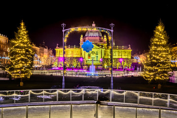 Zagreb christmas advent time. / Scenic night view at Zagreb city center in advent, famous landmarks and ice skating rink, Croatia Europe travel destinations.  - 184795217