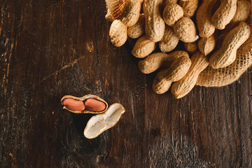 Composition of peanuts serving to make oil, peanut butter. Great for healthy and dietary nutrition. Concept of: condiments, dried fruit, food.