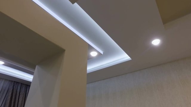 suspended ceiling and drywall construction in the decoration of the apartment or house. dolly video