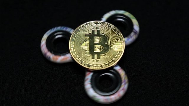 Toy spiner and coin bitcoin.