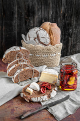 Bread whole wheat leavened handmade cheese and sun-dried tomatoes.