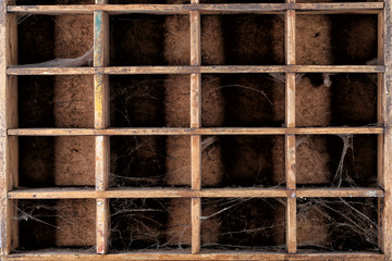 Wooden box catalog with cobwebs