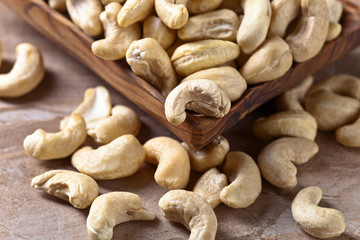 Cashews in old wooden dish