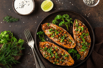 sweet potato stuffed with chickpeas and quinoa.