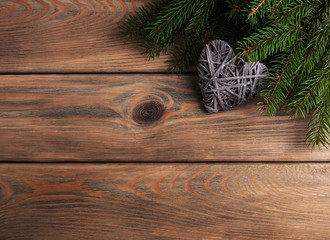 Christmas tree branches with heart decoration