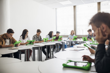 Fototapeta premium Students Studying at Modern Classroom