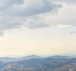 gloomy sky with clouds over the mountains.