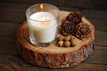 white candle on wood