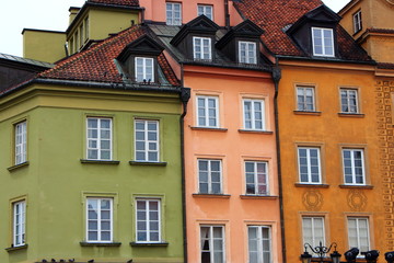Vintage architecture while travel in Poland, Europe. Old town with ancient buildings. Colorful facades with squared windows.