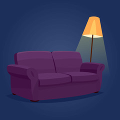 cozy sofa in a dark room with a floor lamp