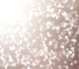 Beige shiny blurred background bokeh,sparkle,beauty,glitter,glowing