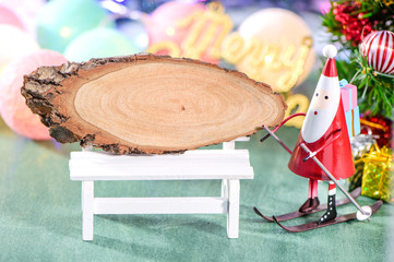 christmas decoration, skating santa claus with wood signboard and 

Christmas imagery isolated on green background