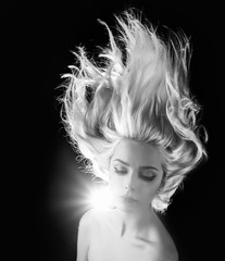 Black and white portrait of a beautiful young woman.