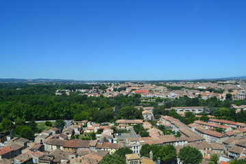 Fototapeta na wymiar city from above with tree blue sky