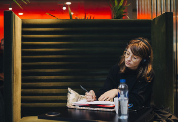 Woman making notes