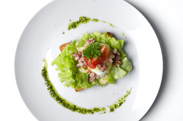 Sandwich with poached egg and bacon